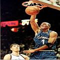 Penny jams while 7'7 Gheorghe Muresan can only watch